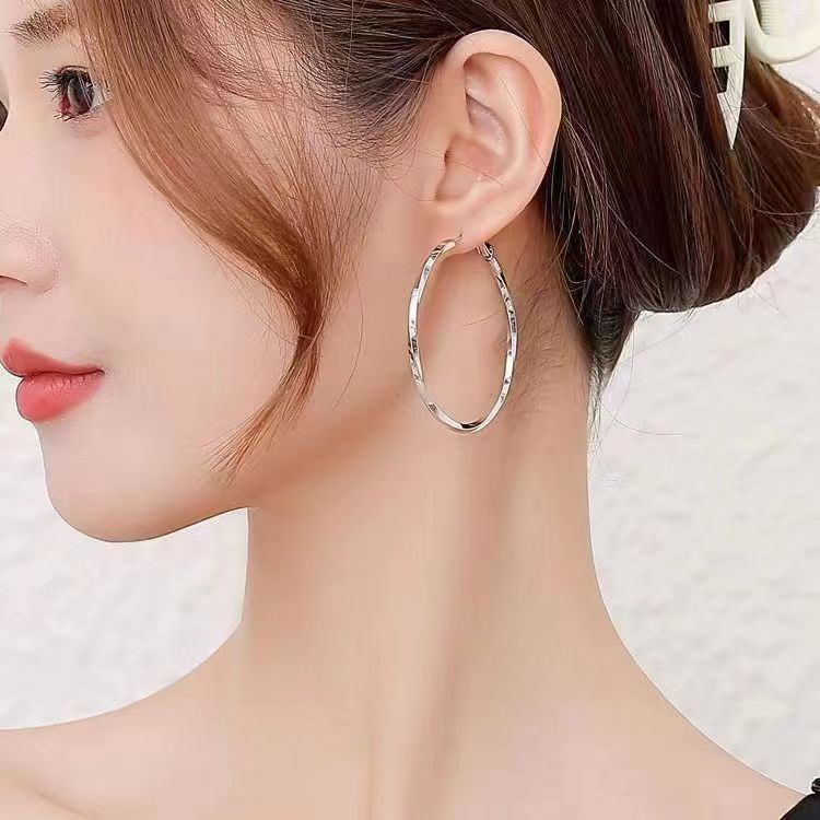 Big ring earrings