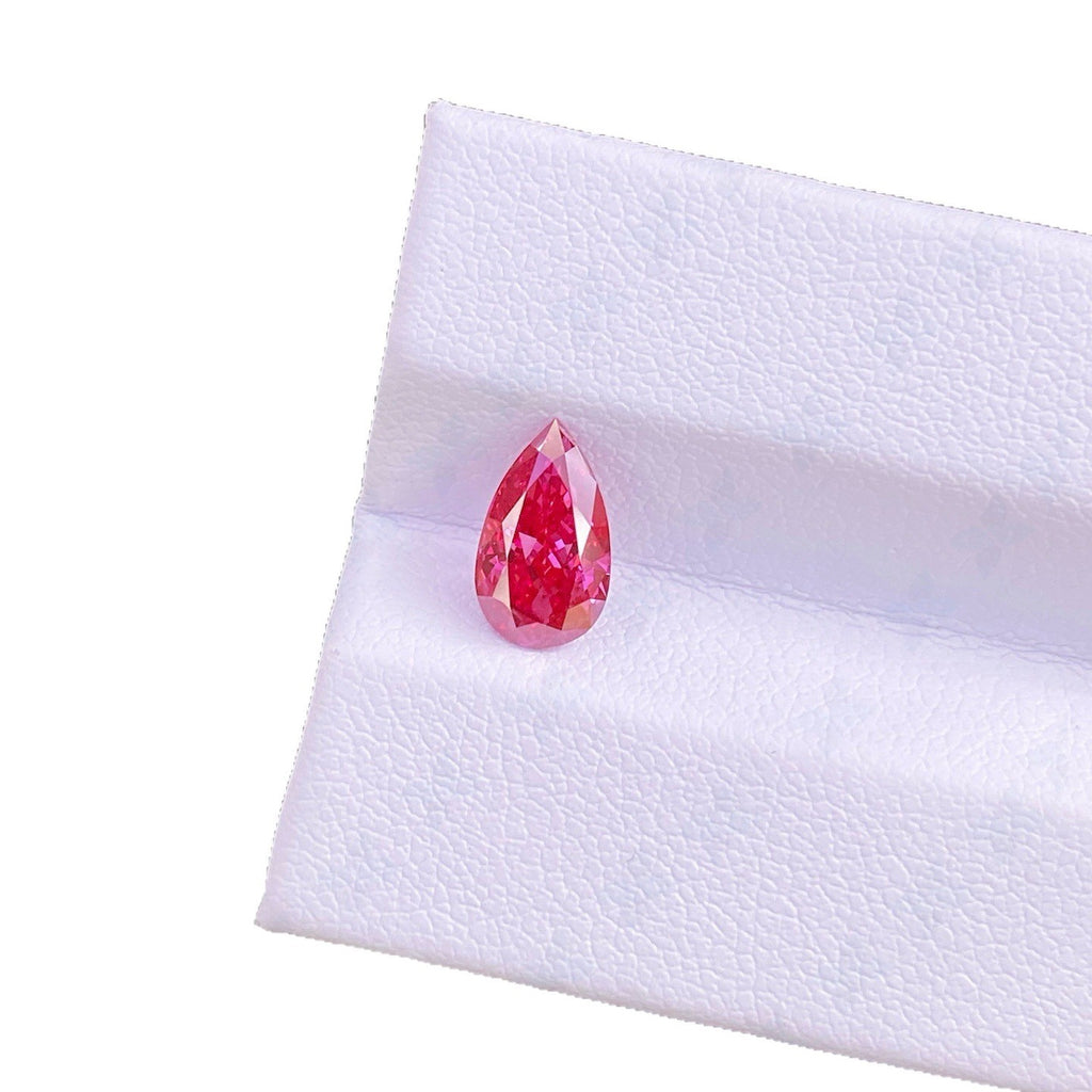 Pearl-shaped colored diamond ring