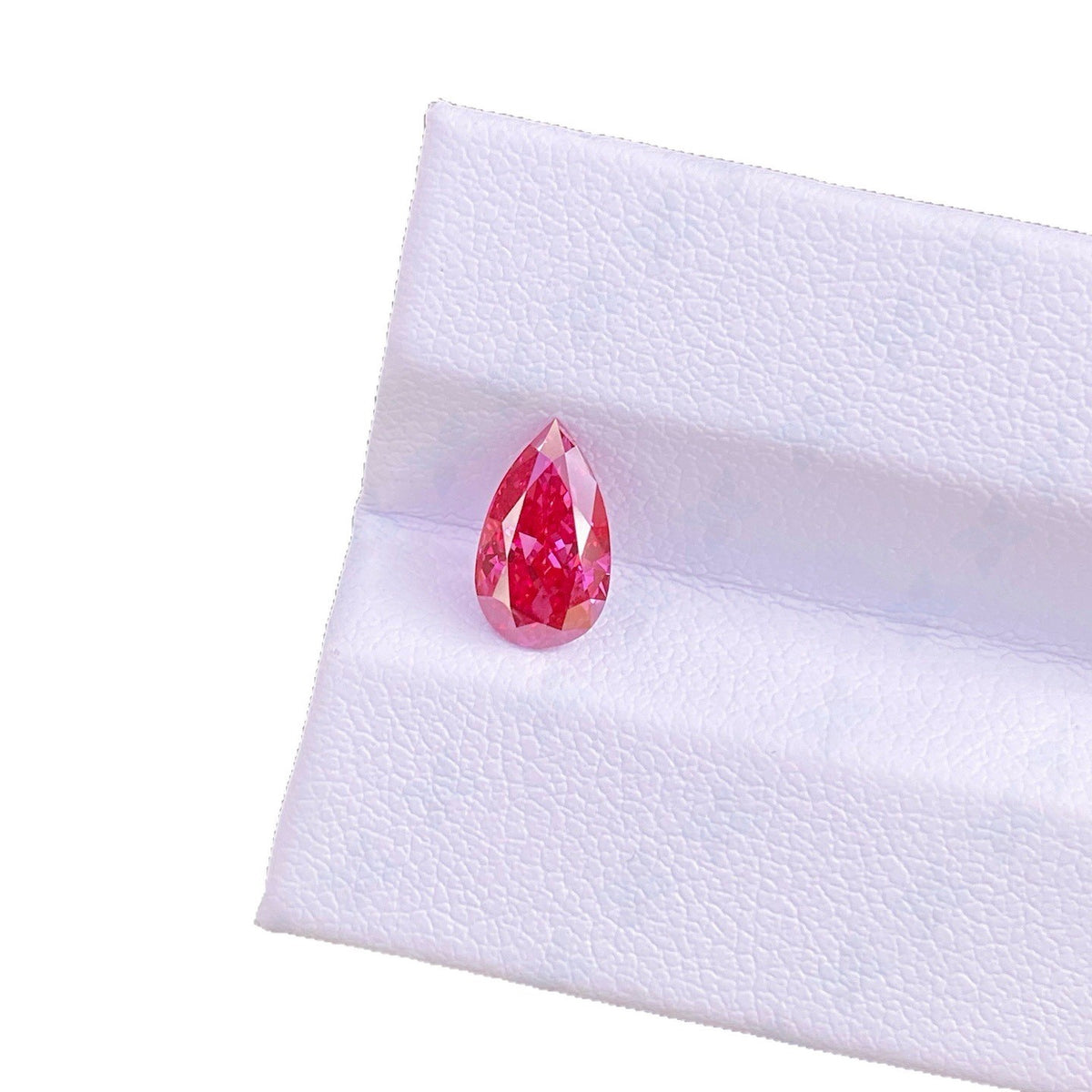 Pearl-shaped colored diamond ring