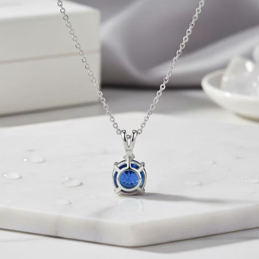 Colored Zircon and Diamond Pendant teemdrop