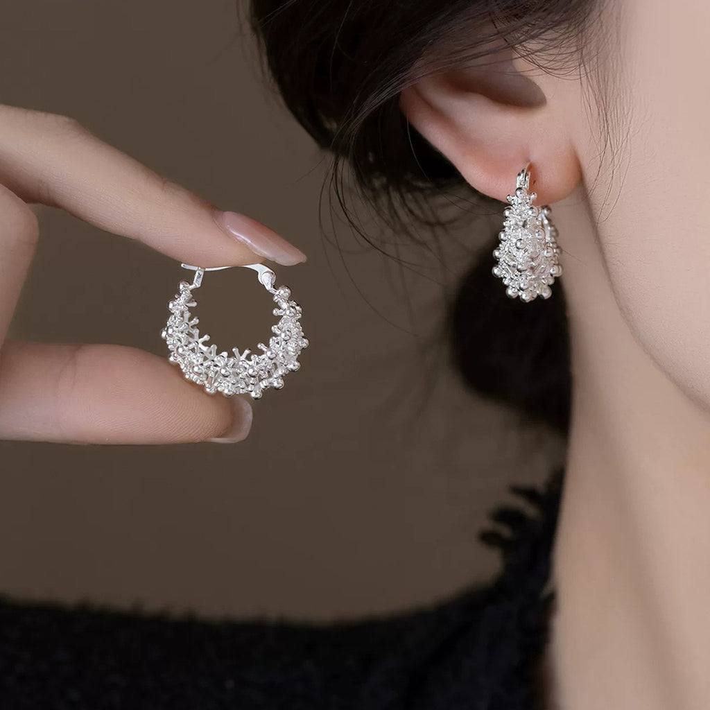 Hollow flower basket earrings