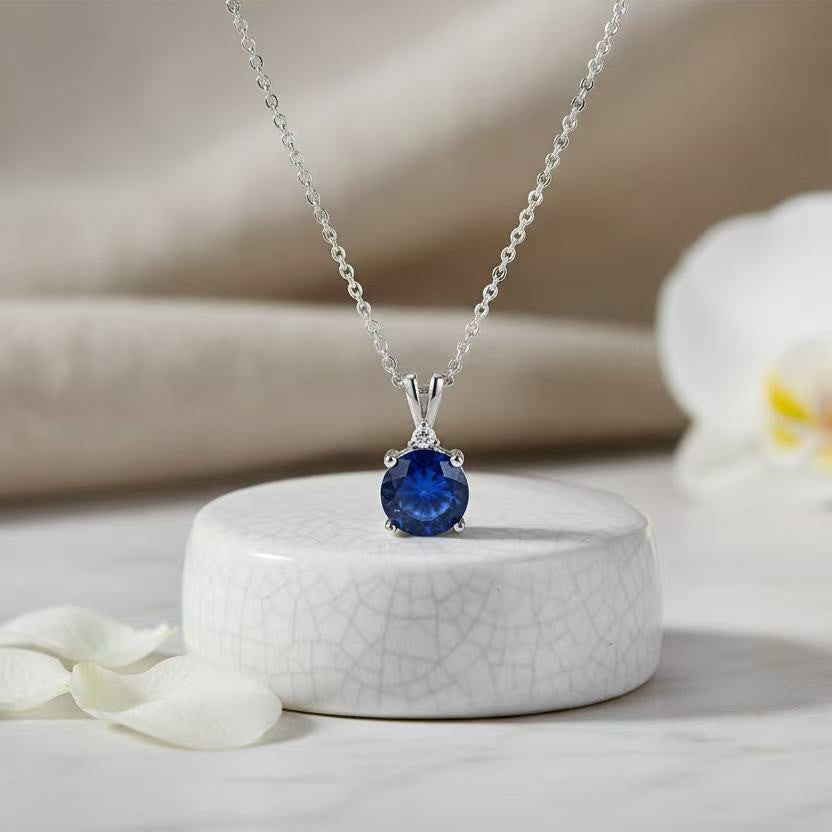 Colored Zircon and Diamond Pendant teemdrop