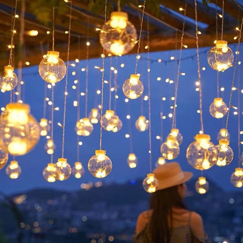 Curtain with star-shaped lights teemdrop
