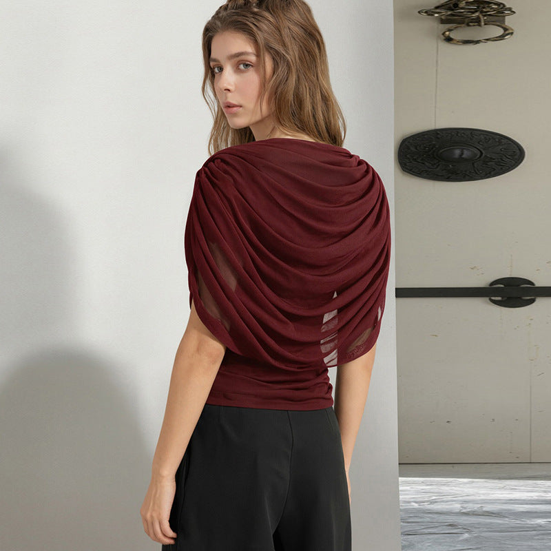 Lady's sleeveless scarf-necked pleated blouse