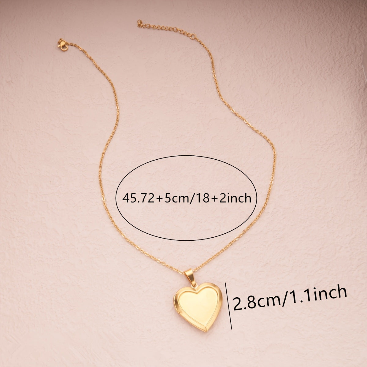 The heart-shaped locket can be opened. teemdrop