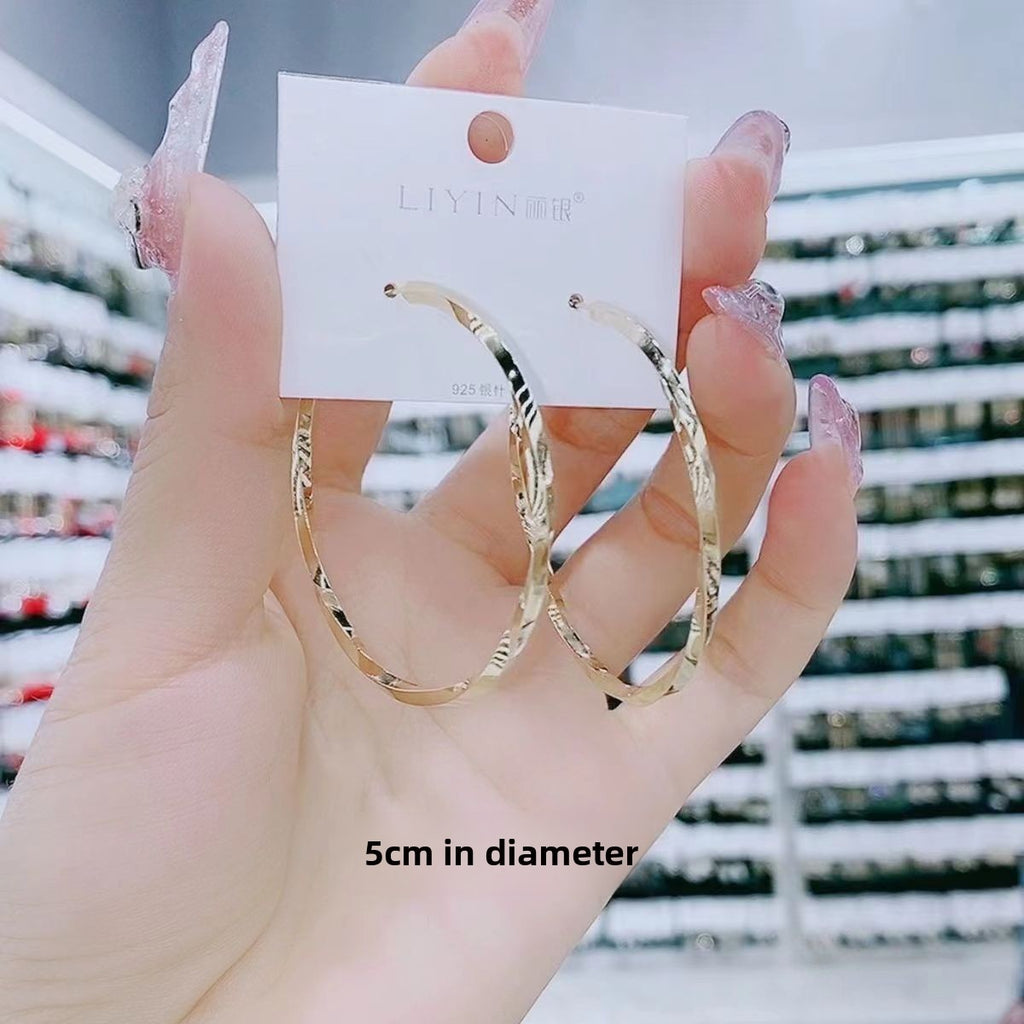 Big ring earrings