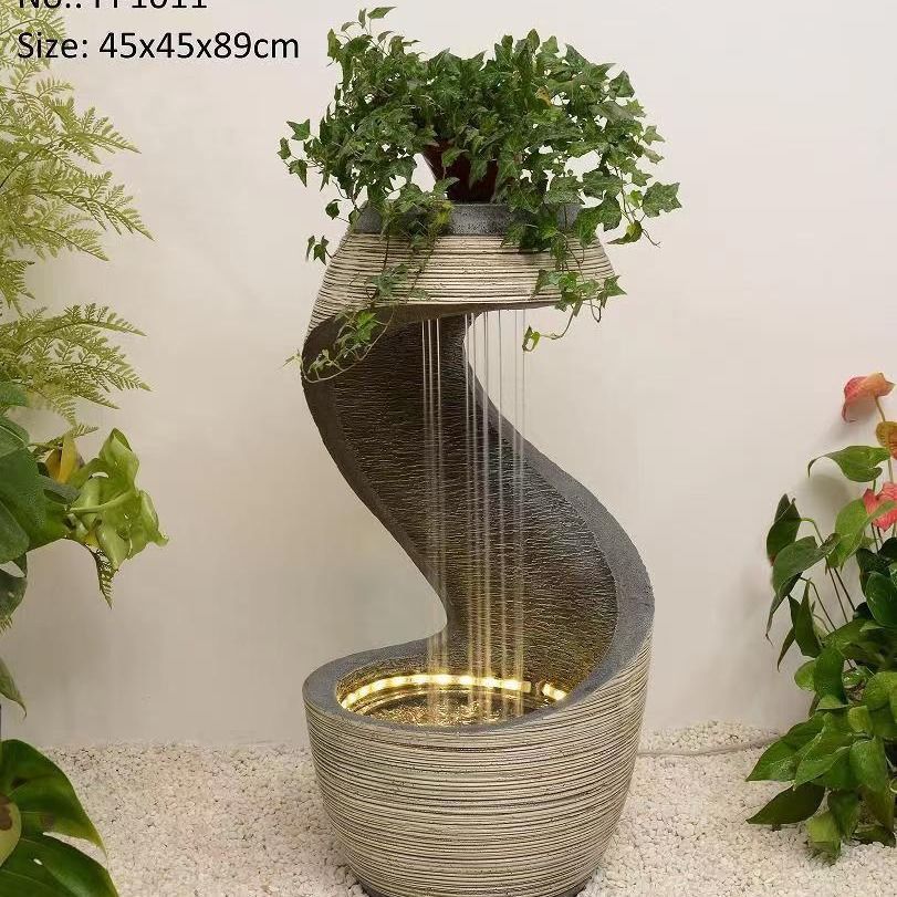 Resin-flowing water feature with indoor floor-standing decorative fountain