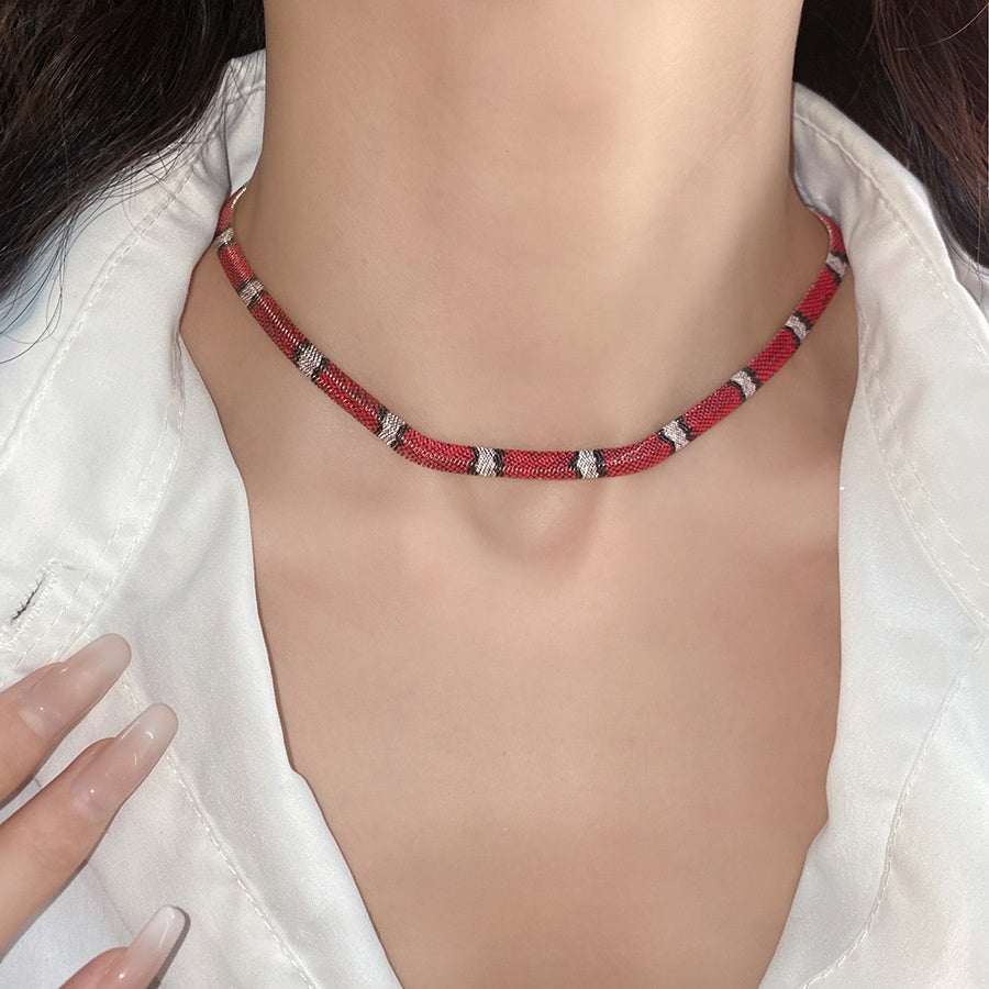 Serpentine geometric necklace