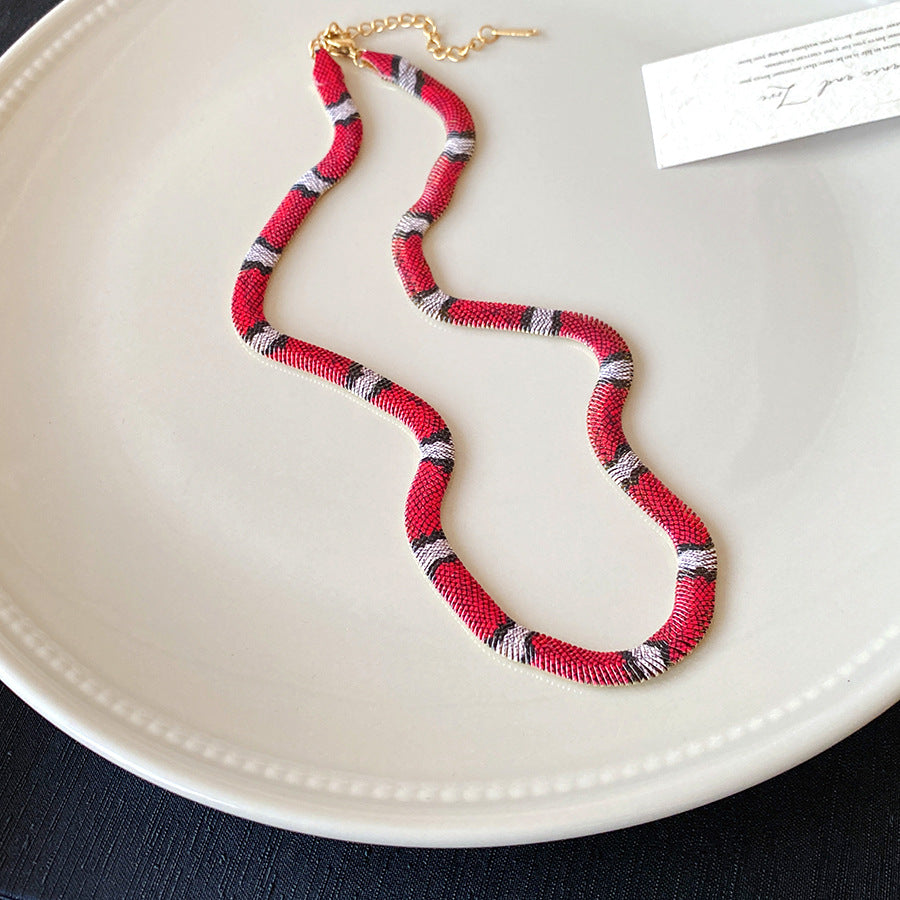 Serpentine geometric necklace