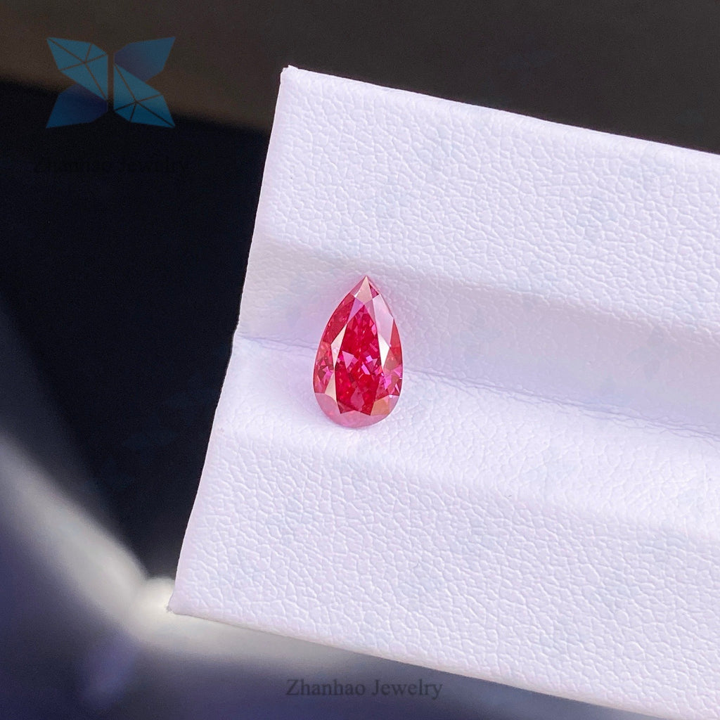 Pearl-shaped colored diamond ring