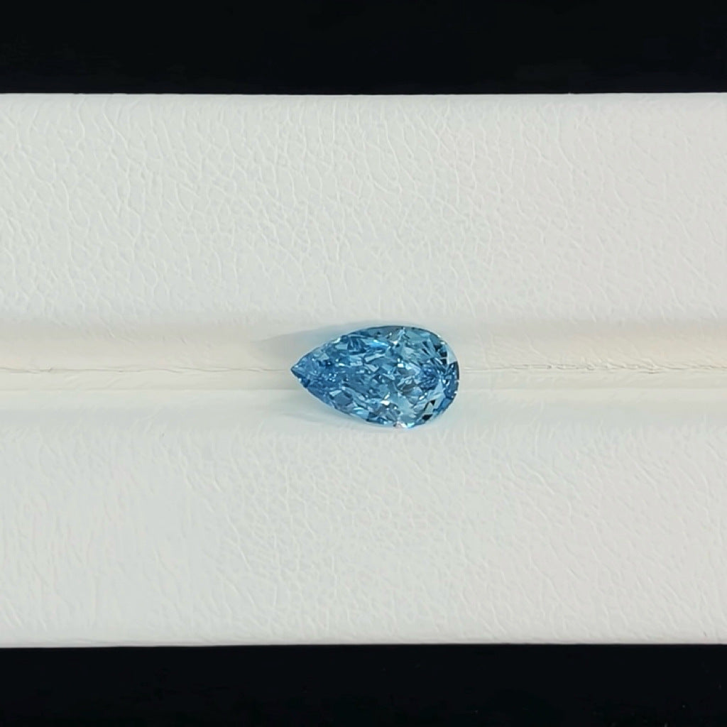 Pear-shaped colored diamond blue diamond ring