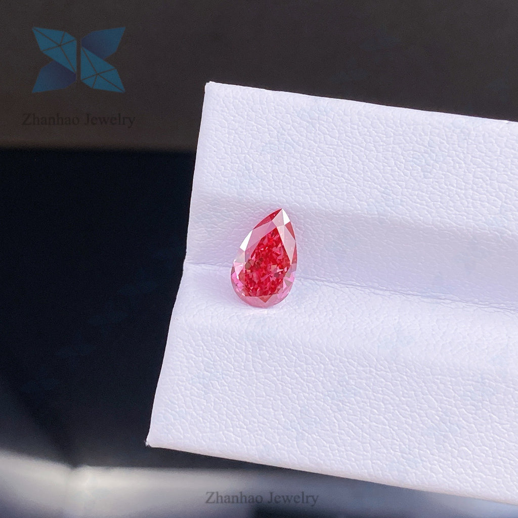 Pearl-shaped colored diamond ring