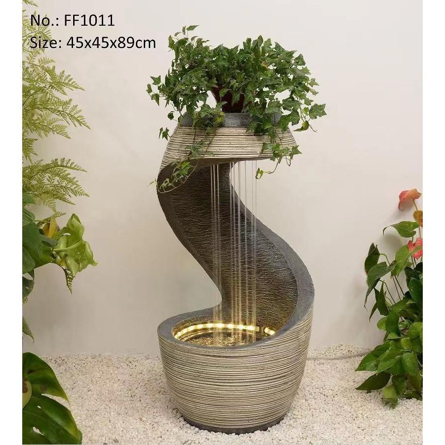 Resin-flowing water feature with indoor floor-standing decorative fountain