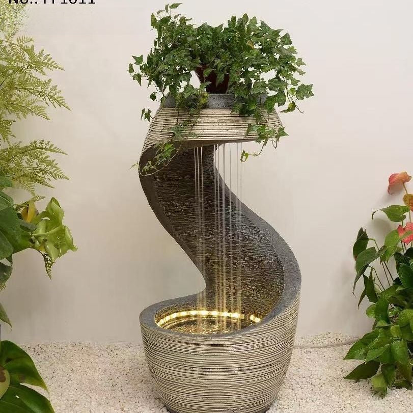 Resin-flowing water feature with indoor floor-standing decorative fountain