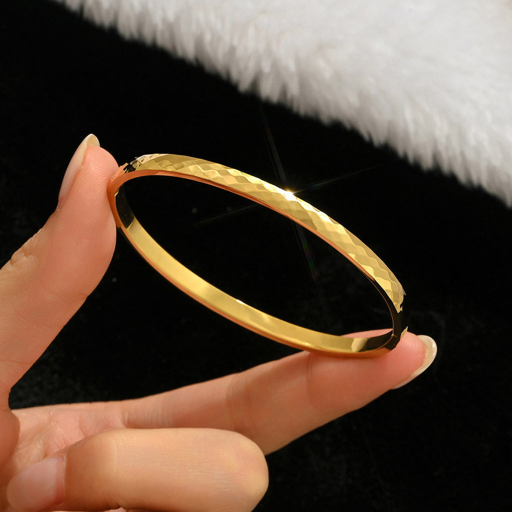 Gold-colored stainless steel bracelet teemdrop