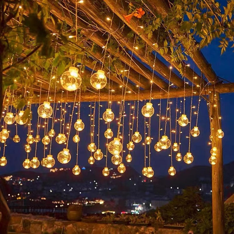 Curtain with star-shaped lights teemdrop