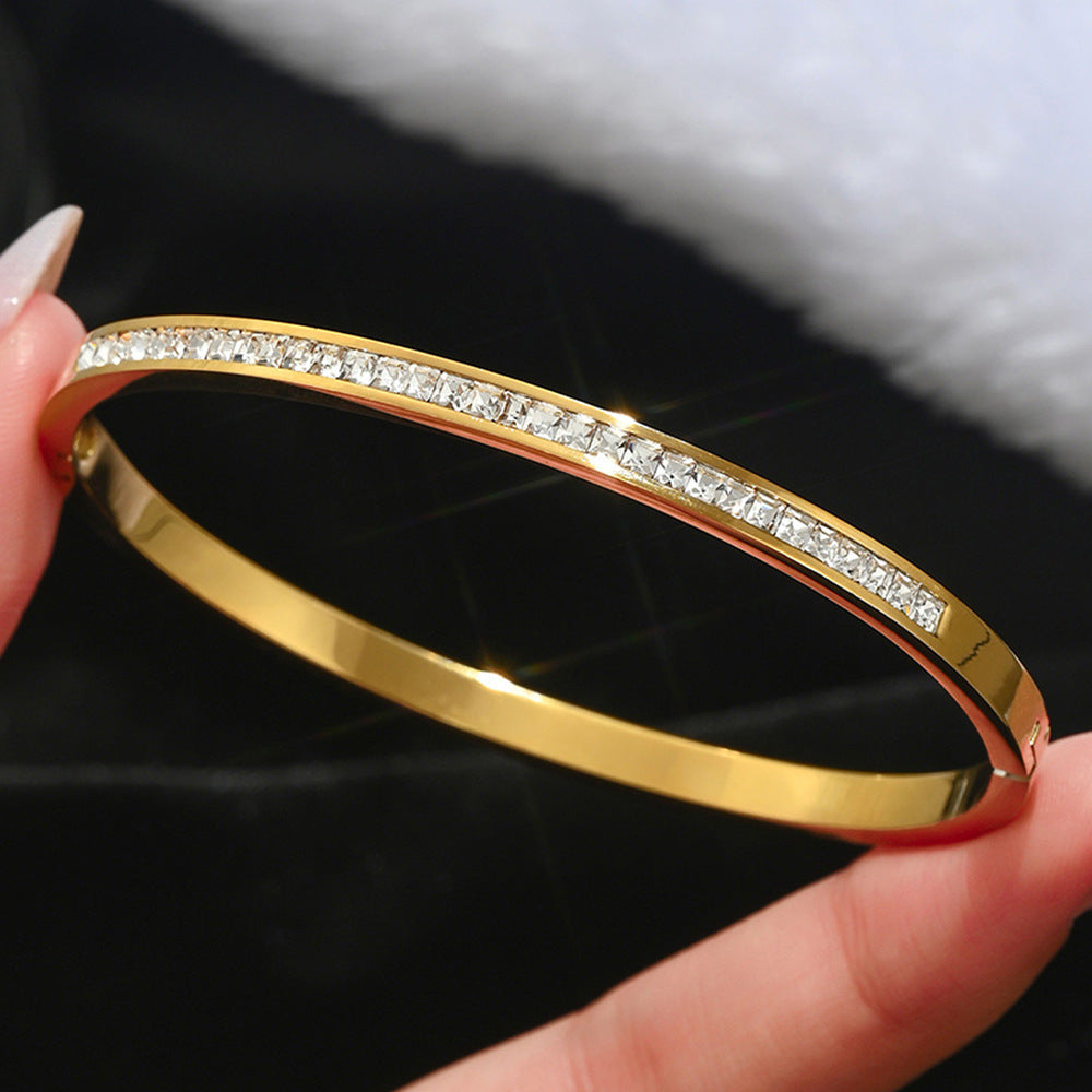 Gold-colored stainless steel bracelet teemdrop