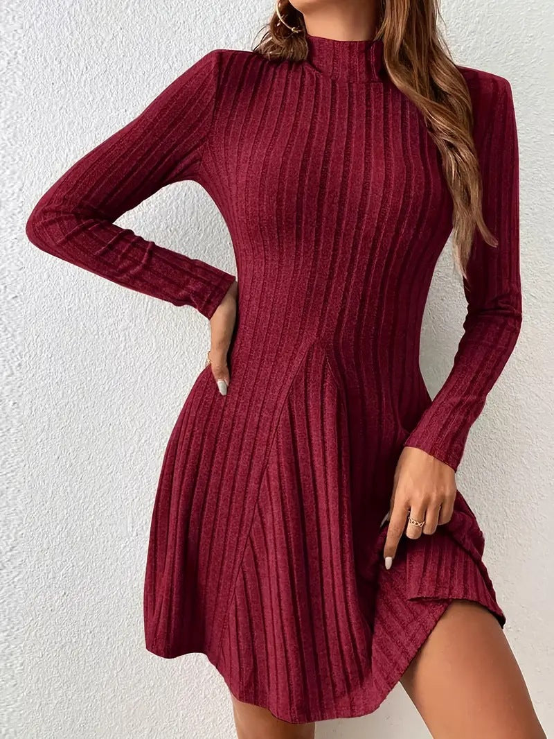 Fitted semi-high neck, waist-cinching long-sleeved dress