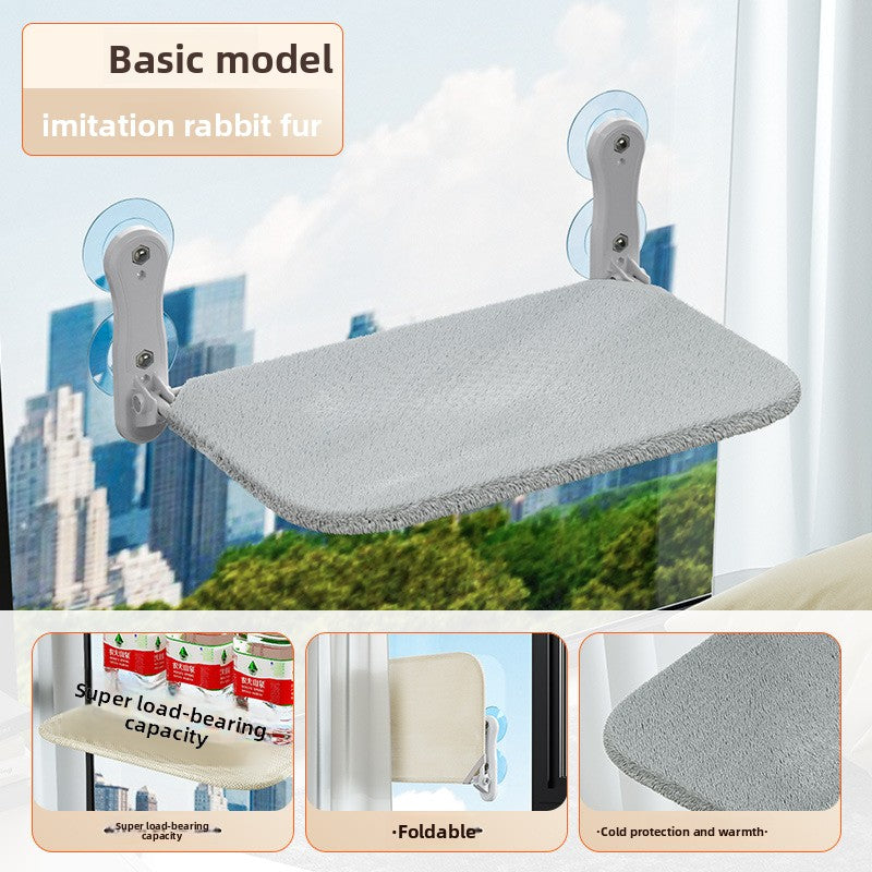 Cats use Windows to hang sucker hammocks